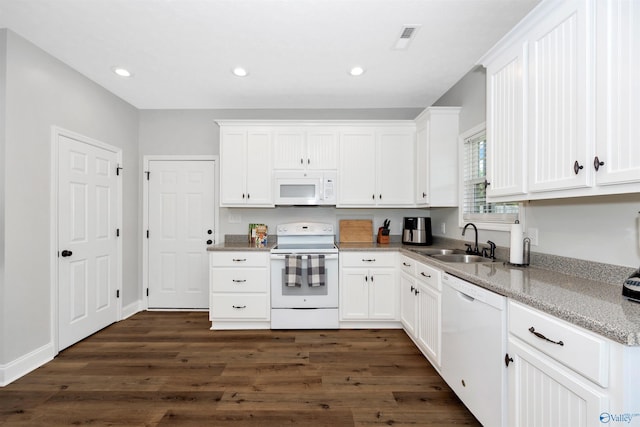 16290 Log Cabin Rd, Athens, AL 35611 - kitchen featuring white appliances, a sink, white cabinetry, dark wood-style flooring, and recessed lighting
