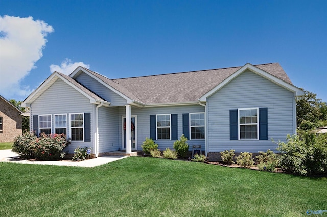 16290 Log Cabin Rd, Athens, AL 35611 - ranch-style house featuring roof with shingles and a front lawn