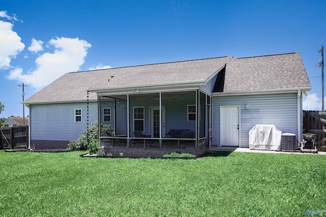 16290 Log Cabin Rd, Athens, AL 35611 - back of house featuring a sunroom, central air condition unit, and roof with shingles