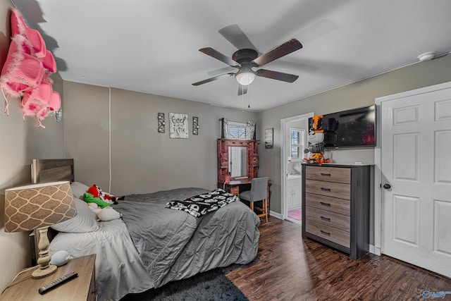 bedroom with ceiling fan, dark hardwood / wood-style floors, and ensuite bathroom