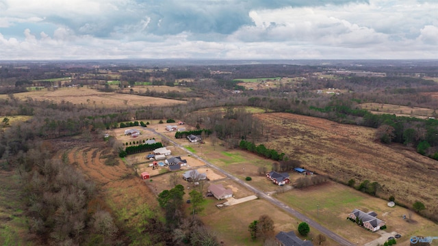 birds eye view of property with a rural view