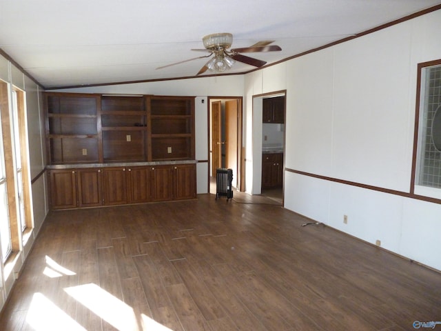 empty room featuring ceiling fan and dark hardwood / wood-style floors