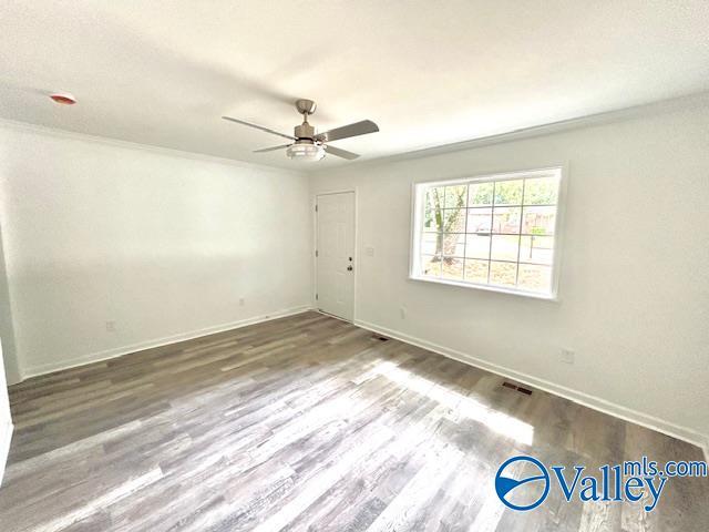 2618 NW Mountain Park Cir, Huntsville, AL 35810 - unfurnished room with ceiling fan and wood finished floors