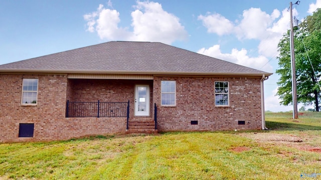 13680 Grigsby Ferry Rd, Elkmont, AL 35620 - rear view of house with crawl space, a yard, brick siding, and roof with shingles