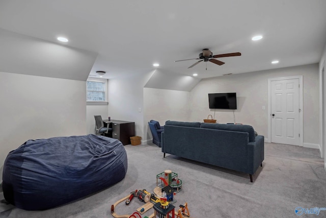 living room with light carpet, ceiling fan, baseboards, and recessed lighting