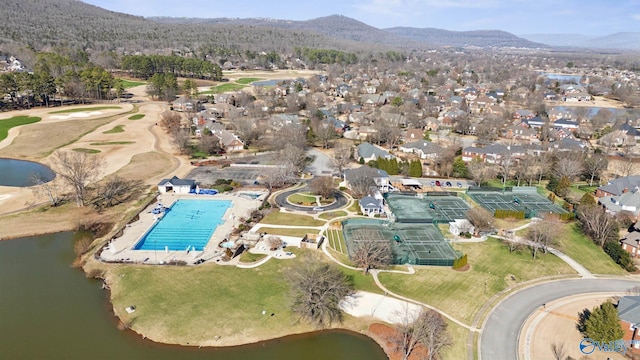 bird's eye view featuring a residential view and a water and mountain view