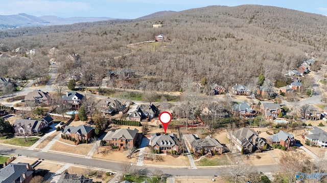 bird's eye view with a residential view and a mountain view