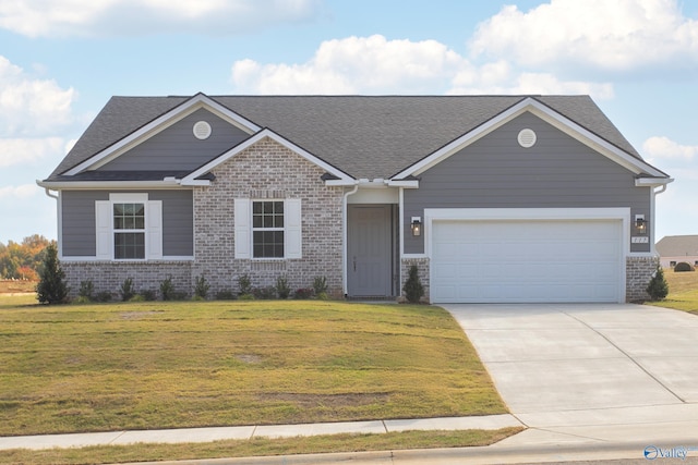 view of front of property with a garage and a front yard