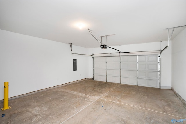 garage with a garage door opener and electric panel