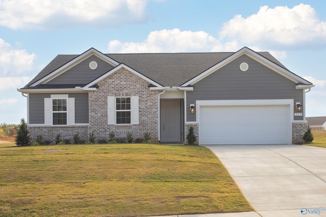 view of front facade featuring a garage and a front yard