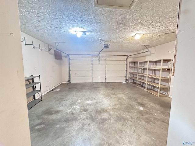 203 Lincoln Ave, Muscle Shoals, AL 35661 - garage featuring a garage door opener