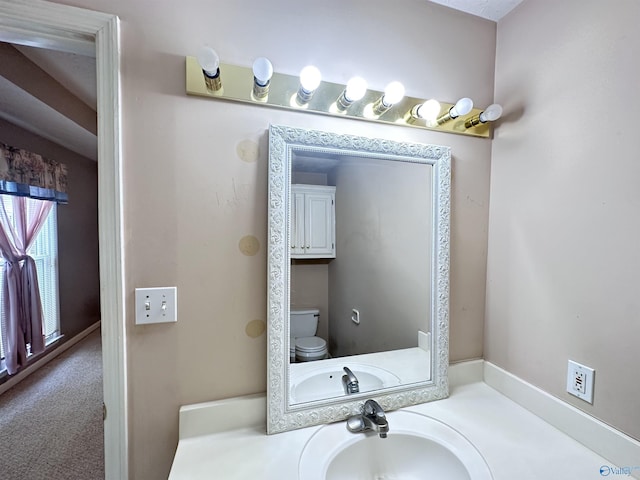 203 Lincoln Ave, Muscle Shoals, AL 35661 - bathroom with toilet and vanity