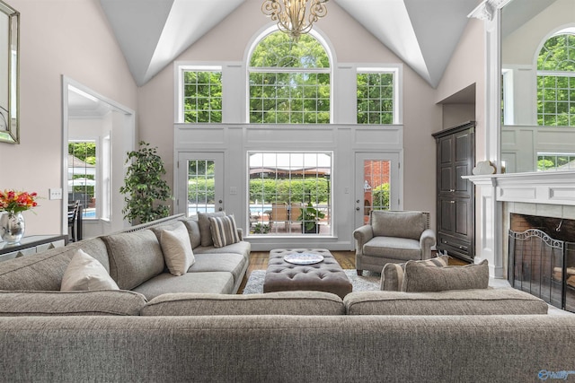 758 County Road 555, Valley Head, AL 35989 - living room featuring wood finished floors, a fireplace, and high vaulted ceiling