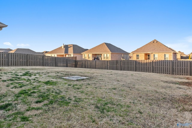 view of yard featuring a fenced backyard