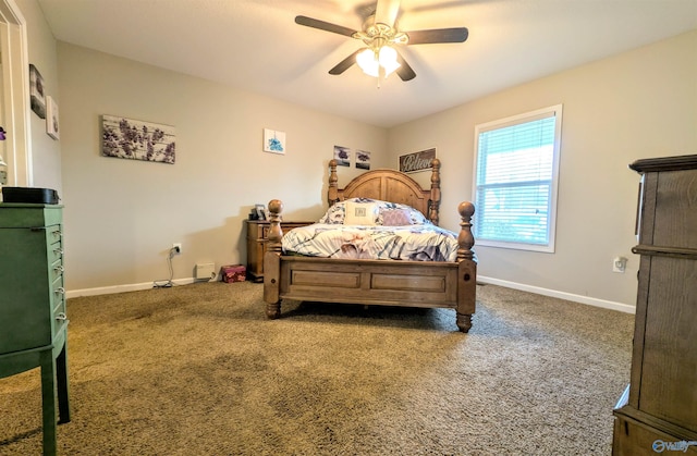 bedroom featuring carpet flooring, a ceiling fan, and baseboards