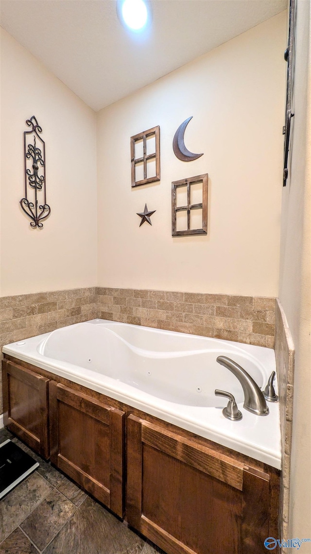 bathroom featuring a jetted tub