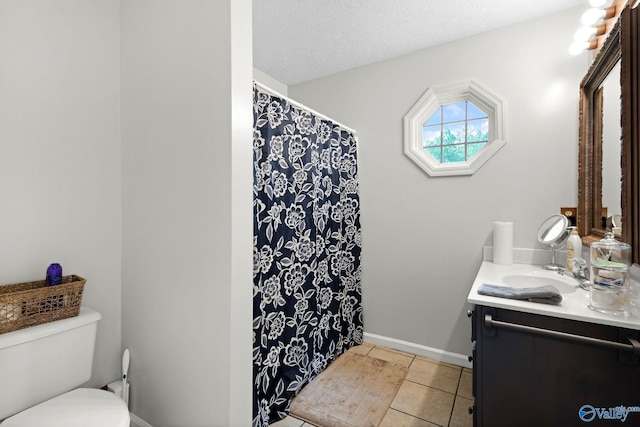 14249 Parker Rd, Athens, AL 35611 - full bathroom with vanity, toilet, tile patterned flooring, a shower with curtain, and baseboards