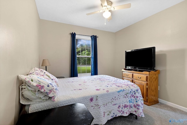 14249 Parker Rd, Athens, AL 35611 - bedroom featuring light carpet, baseboards, and ceiling fan