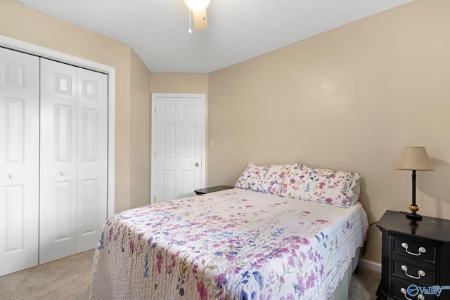 14249 Parker Rd, Athens, AL 35611 - bedroom featuring carpet floors, a closet, and a ceiling fan