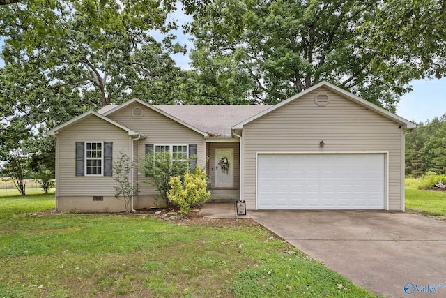 14249 Parker Rd, Athens, AL 35611 - ranch-style house featuring crawl space, concrete driveway, an attached garage, and a front lawn