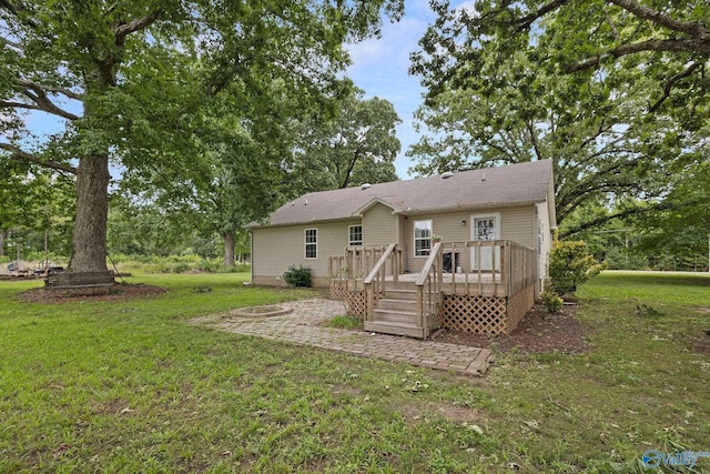 14249 Parker Rd, Athens, AL 35611 - rear view of property featuring a lawn and a deck