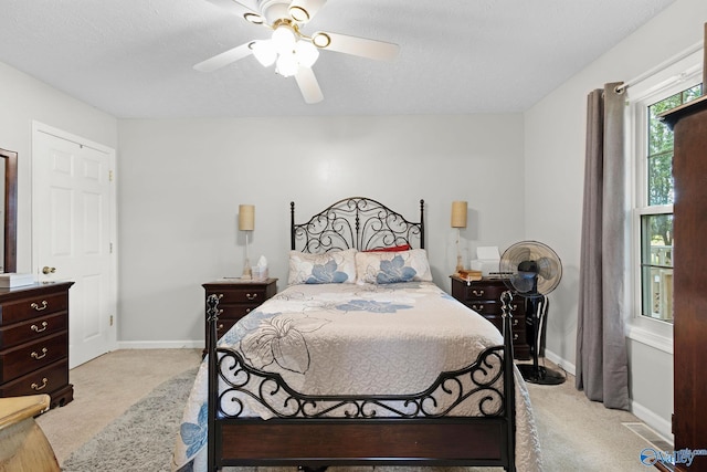 14249 Parker Rd, Athens, AL 35611 - bedroom featuring carpet, ceiling fan, baseboards, and a textured ceiling