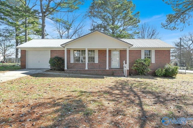 ranch-style house featuring a garage, a front yard, and a porch