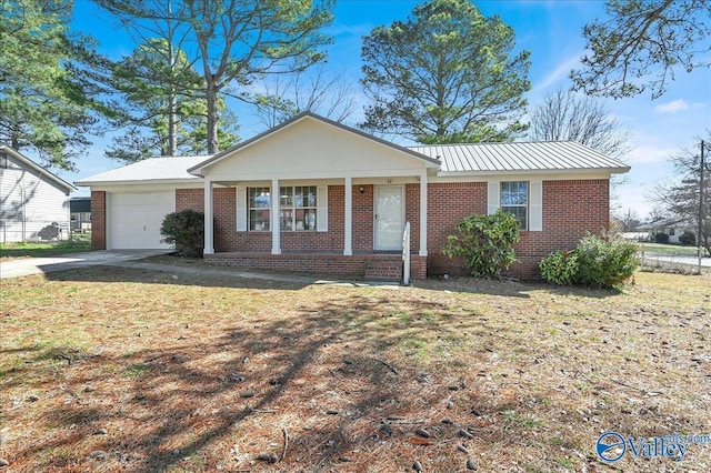 single story home featuring a garage, a porch, and a front lawn