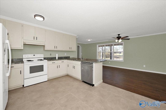 kitchen featuring white cabinetry, white appliances, ornamental molding, and kitchen peninsula