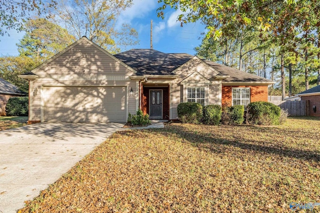 single story home with a front lawn and a garage