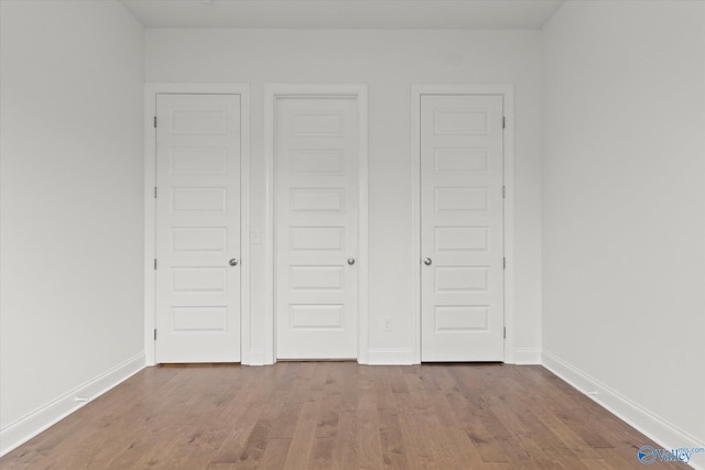 unfurnished bedroom featuring light hardwood / wood-style flooring