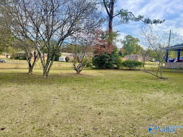 view of yard featuring fence