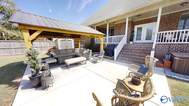 view of patio / terrace featuring outdoor lounge area and a gazebo