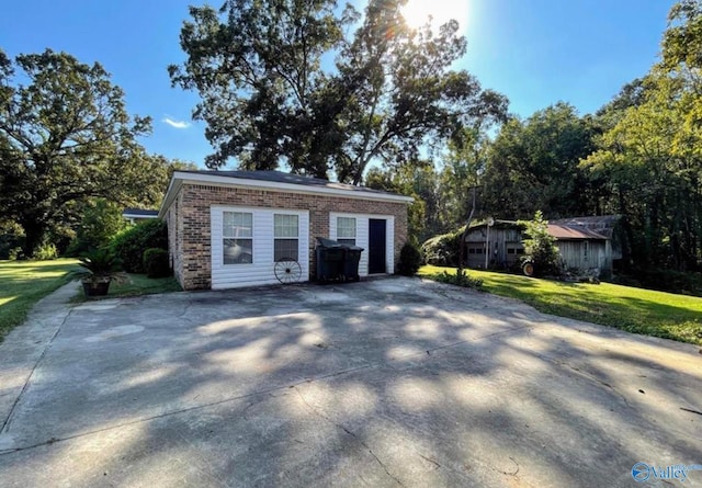 garage featuring a yard