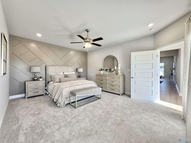 carpeted bedroom with ceiling fan