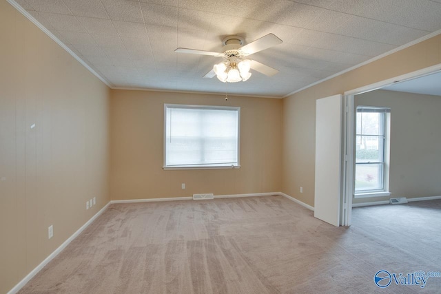 8201 Willowbrook Cir Unit B, Huntsville, AL 35802 - empty room featuring ornamental molding, light carpet, a ceiling fan, and baseboards