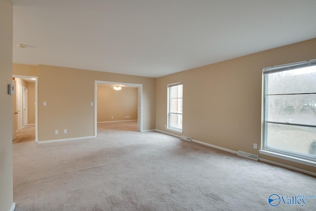 8201 Willowbrook Cir Unit B, Huntsville, AL 35802 - spare room featuring light carpet and baseboards