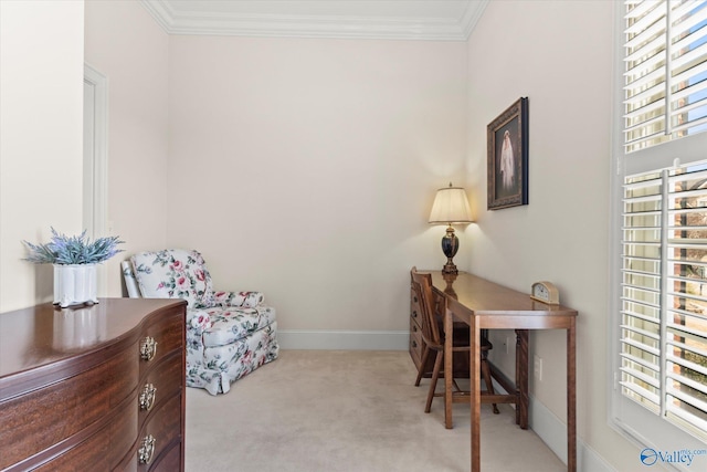 sitting room featuring light carpet, crown molding, and baseboards