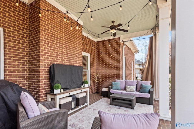 view of patio featuring ceiling fan and an outdoor living space