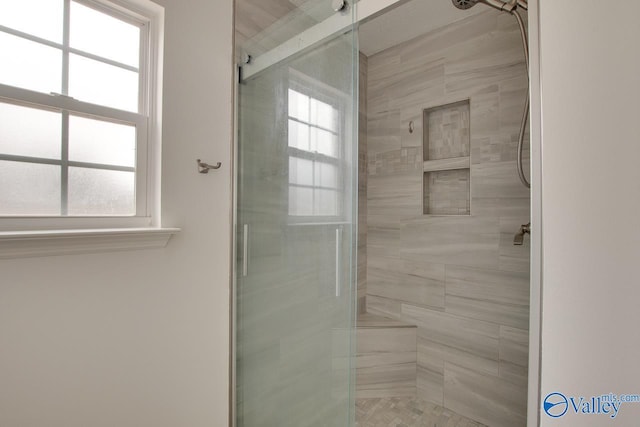 bathroom featuring a stall shower