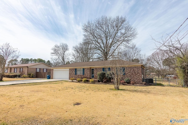 ranch-style house with central AC, fence, concrete driveway, a garage, and brick siding