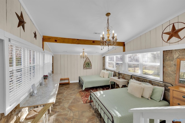 bedroom with an inviting chandelier, stone finish floor, vaulted ceiling with beams, and visible vents