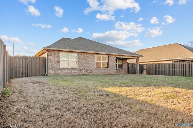 132 Fall Meadow Dr, Harvest, AL 35749 - rear view of house with brick siding and a shingled roof
