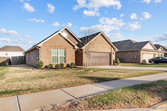 132 Fall Meadow Dr, Harvest, AL 35749 - view of front of home featuring brick siding, a garage, and concrete driveway