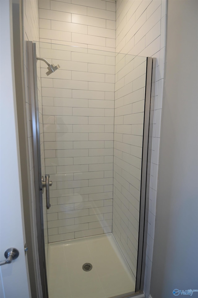 bathroom featuring a stall shower