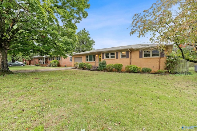 ranch-style home with a front yard