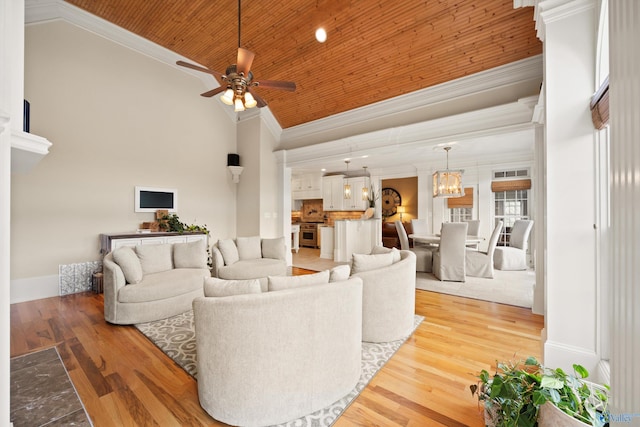 living room with high vaulted ceiling, ornamental molding, hardwood / wood-style floors, and wooden ceiling