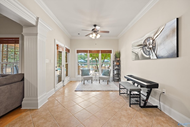 interior space with light tile patterned floors, ornamental molding, and ceiling fan