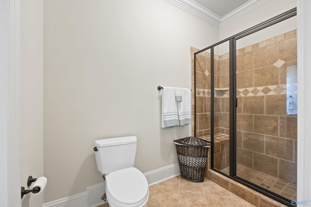 bathroom with a shower with door, ornamental molding, tile patterned floors, and toilet