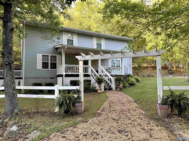 view of front of house featuring fence, crawl space, a wooden deck, a pergola, and a front lawn